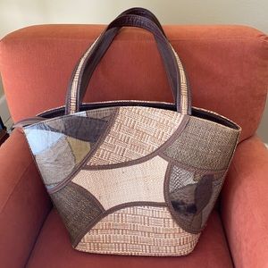 Straw bag. Lined. Zipper. Roomy.